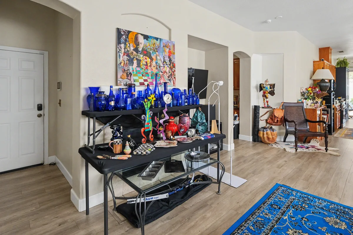 Art and glassware, clearly displayed at a previous 916 Estate Sales event