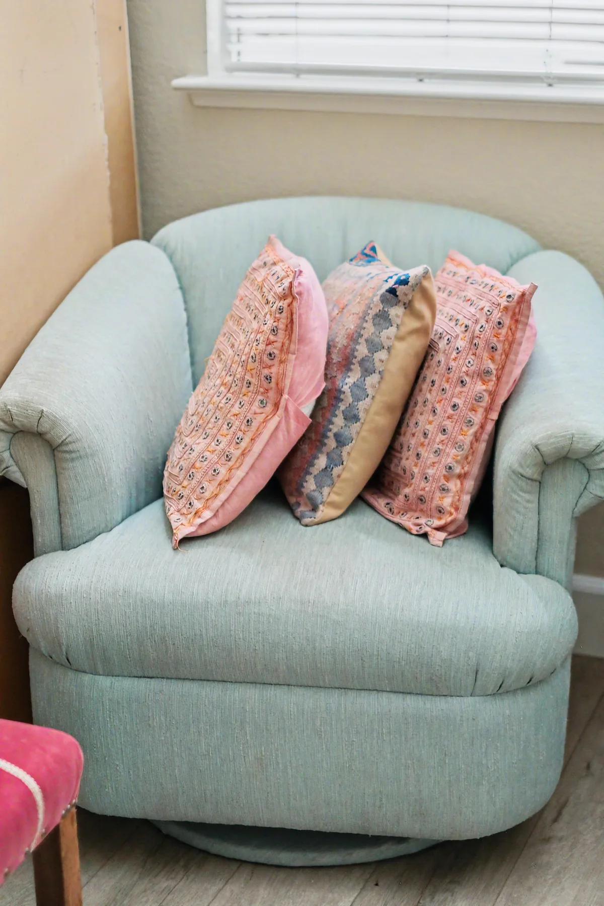 Armchair with cushions photographed at a 916 Estate Sales event