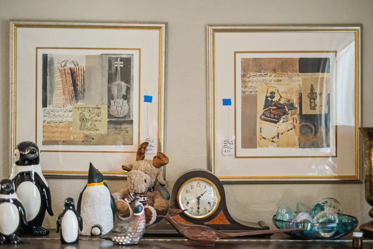 Framed art and console photographed at a 916 Estate Sales event