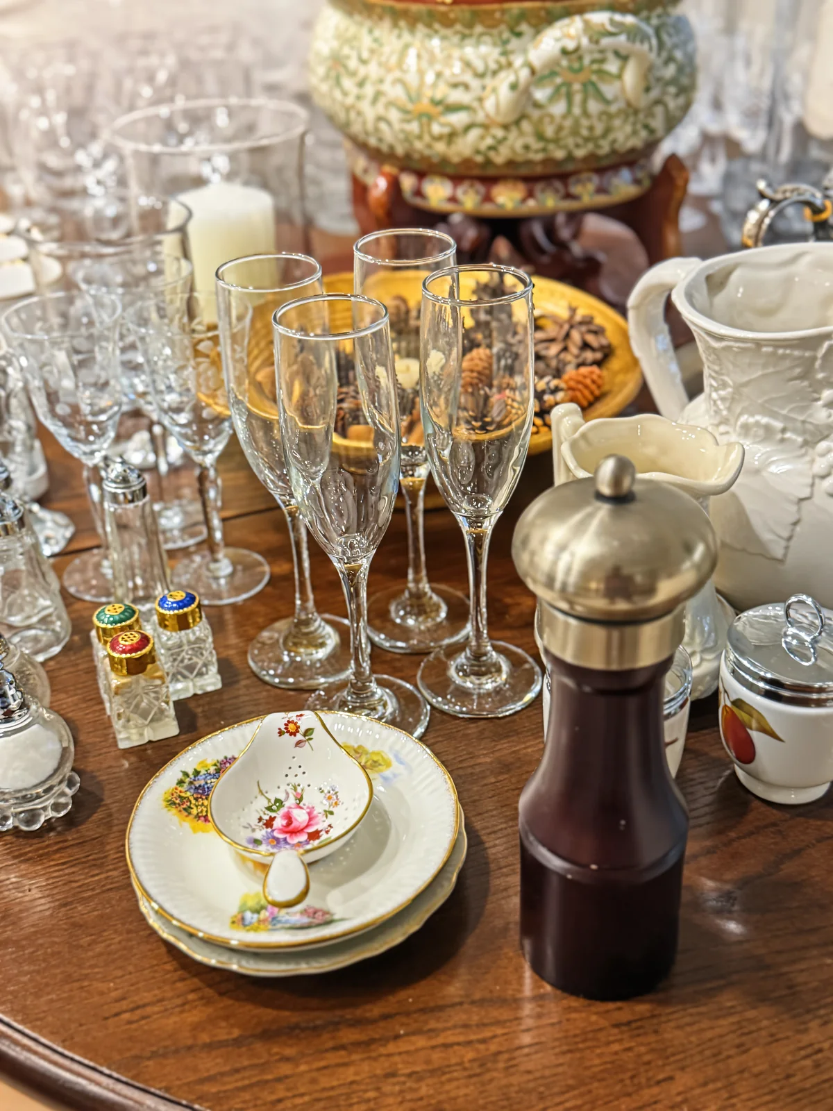 Glassware display photographed at a 916 Estate Sales event